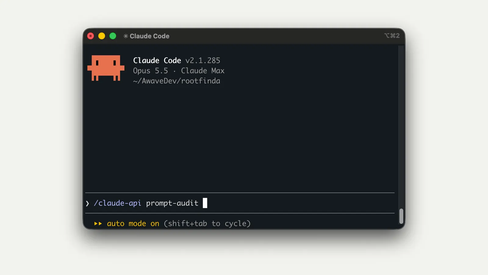 A Claude Code v2.1.285 terminal running Opus 5.5, with /claude-api prompt-audit typed at the prompt and auto mode on.